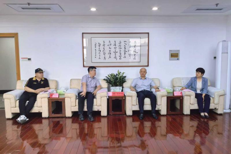 汪华东会见阿拉丁控股集团客人